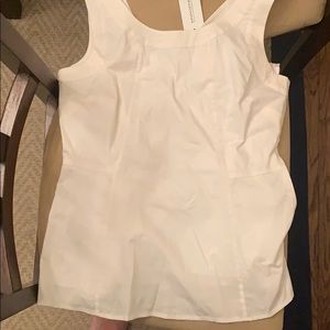 White sleeveless blouse